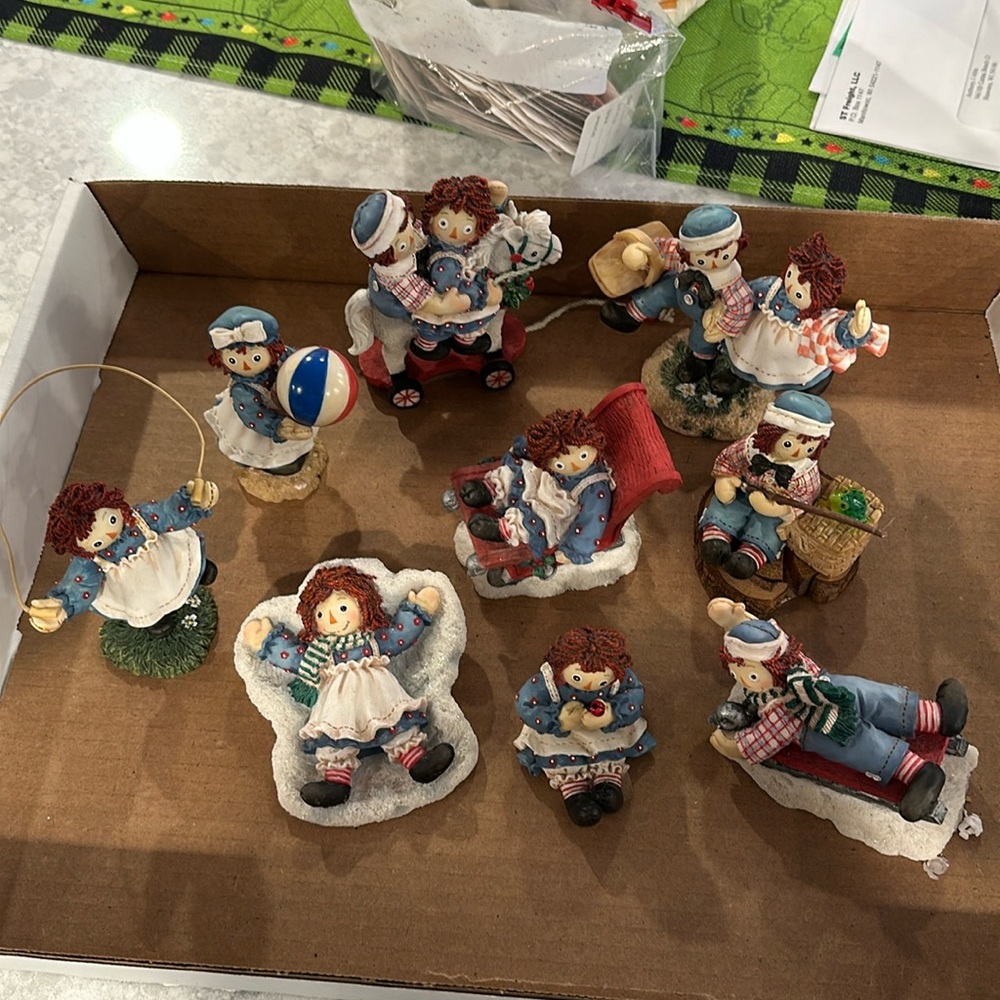9 Raggedy Ann and Andy figurines